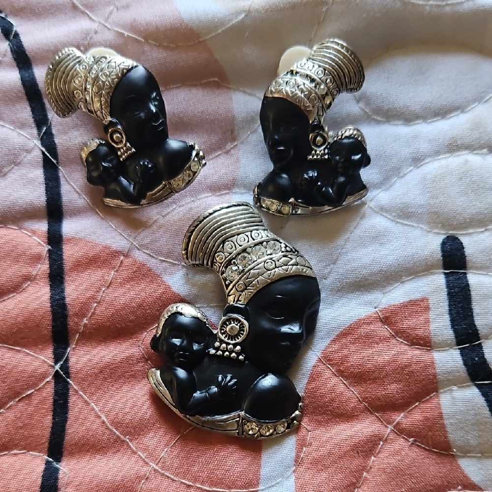 Black and Silver Brooches with Intricate Design